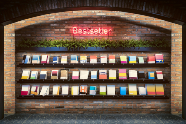 books facing cover-out on a shelf